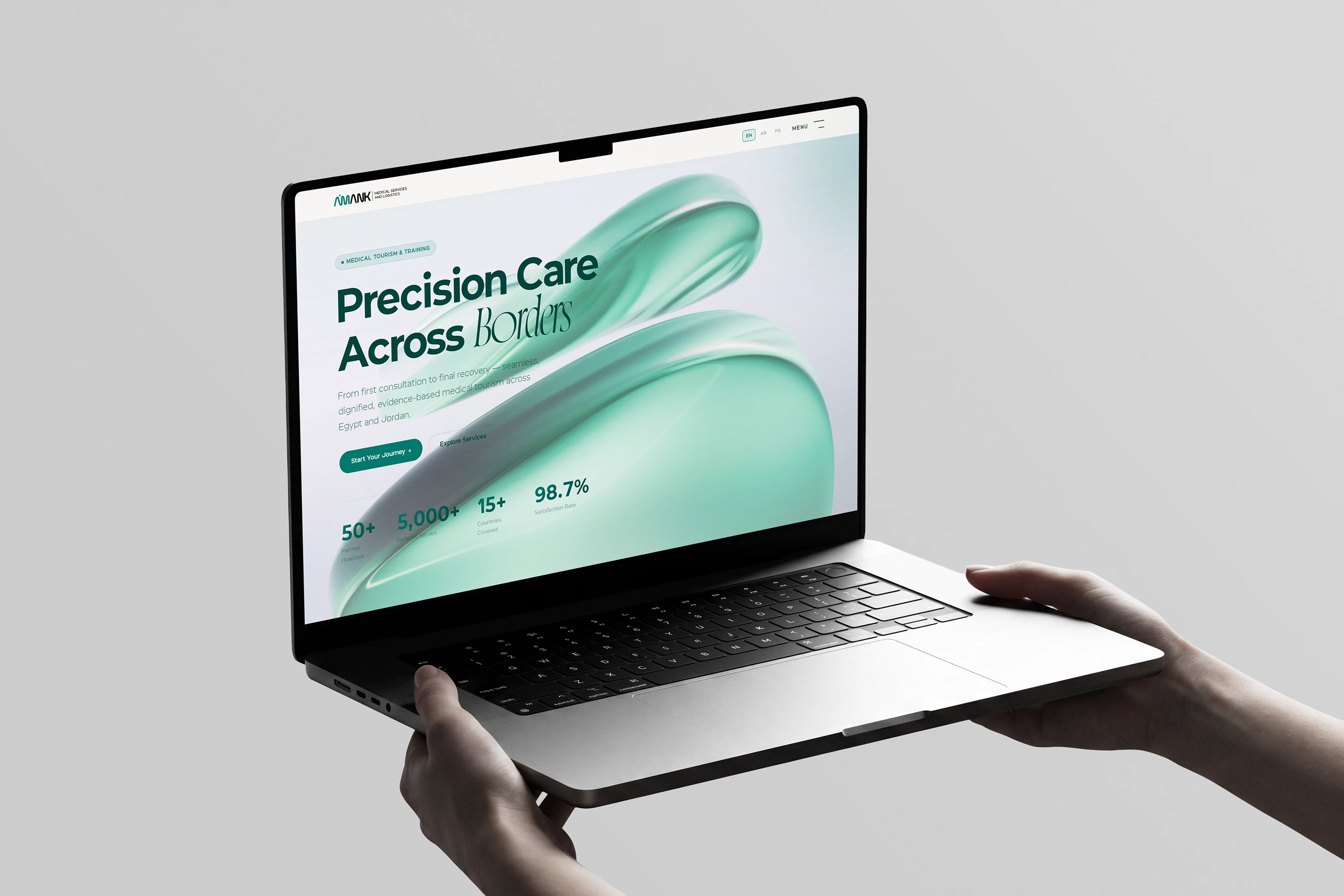 موقع أمانك على شاشة حاسوب محمول: «Precision Care Across Borders»